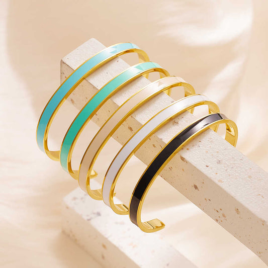 Unik Stainless steel 18K gold plated flange drops bangle