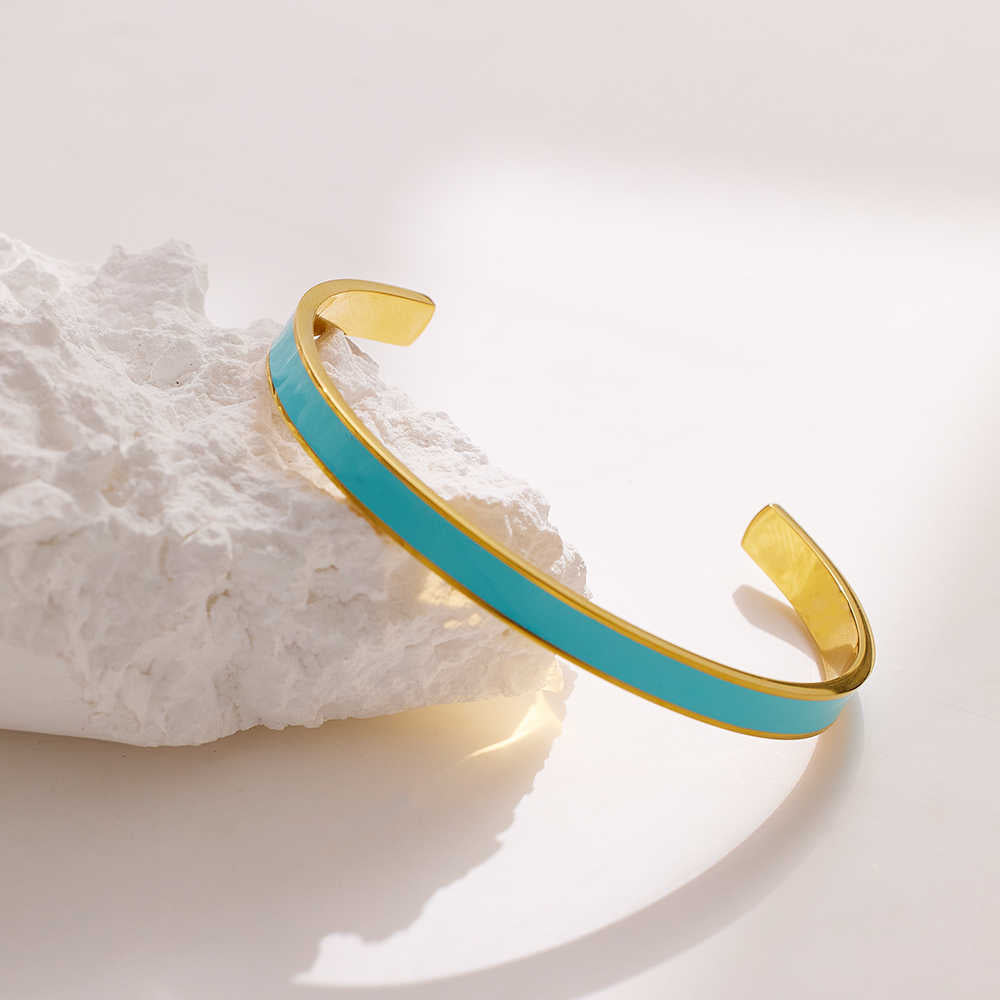 Unik Stainless steel 18K gold plated flange drops bangle