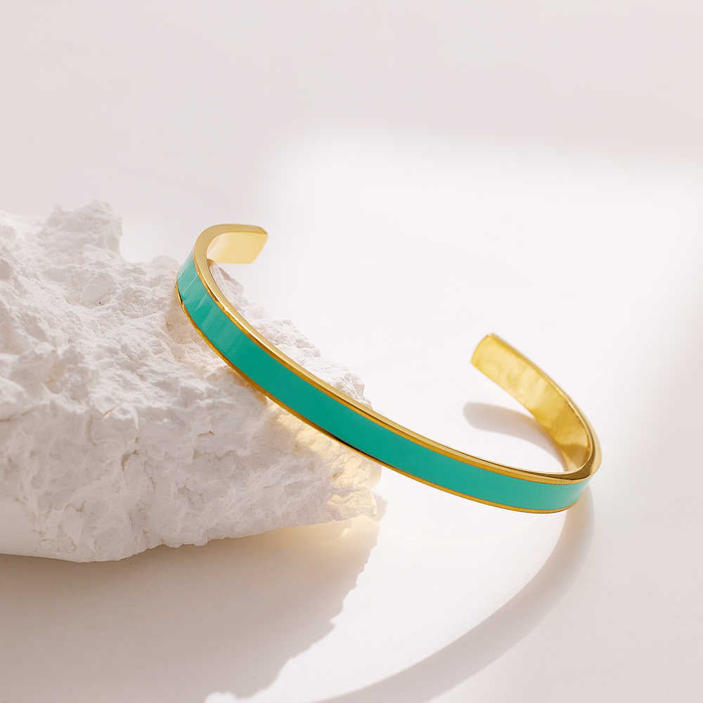 Unik Stainless steel 18K gold plated flange drops bangle