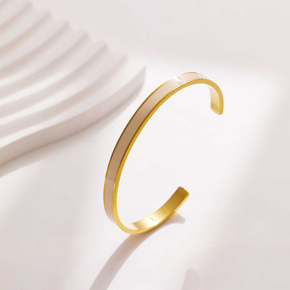 Unik Stainless steel 18K gold plated flange drops bangle