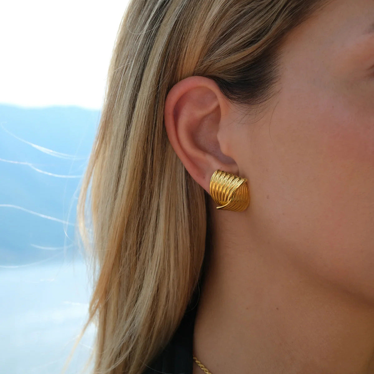 Unik 18-karat gold plated stainless steel interlaced earrings with stripe texture