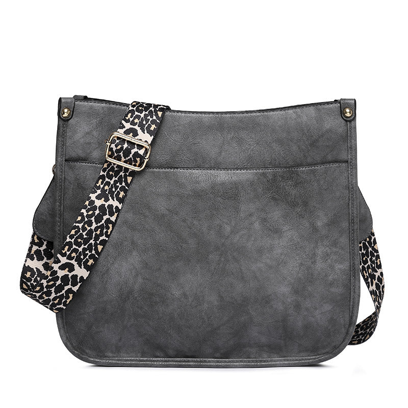 Unik Classic Leather Crossbody Bag with Leopard print shoulder strap