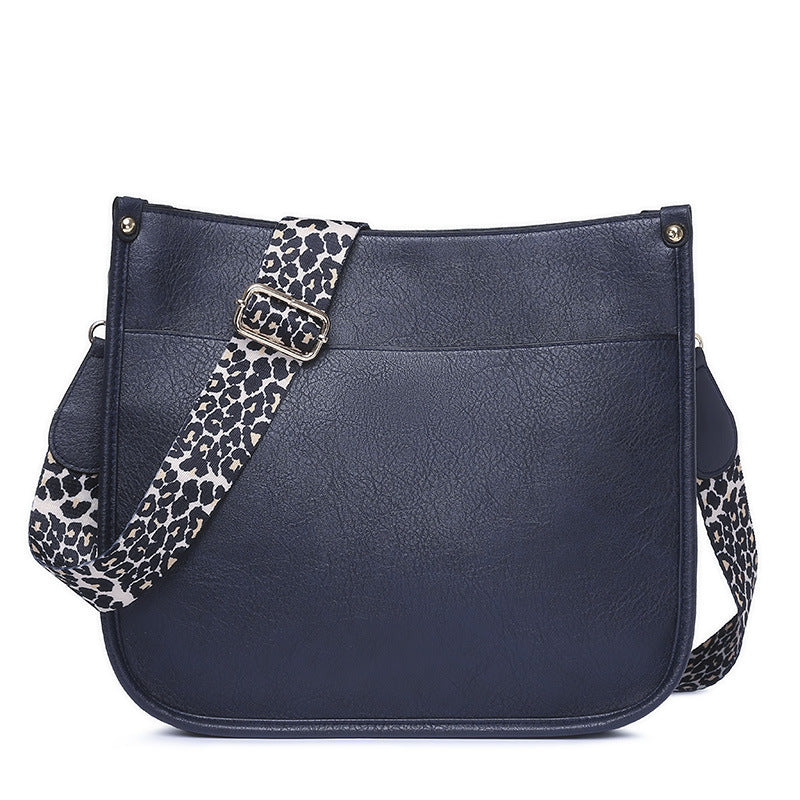 Unik Classic Leather Crossbody Bag with Leopard print shoulder strap