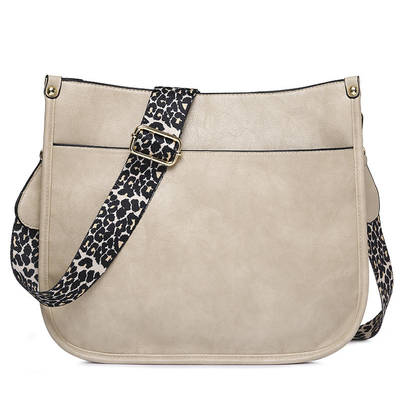 Unik Classic Leather Crossbody Bag with Leopard print shoulder strap