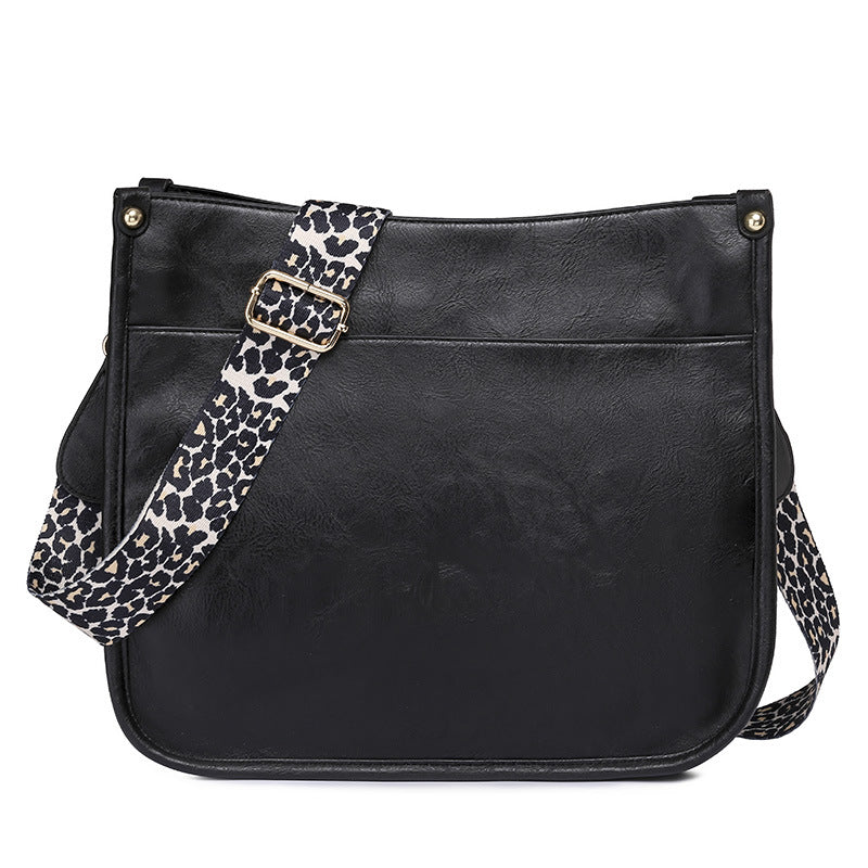 Unik Classic Leather Crossbody Bag with Leopard print shoulder strap