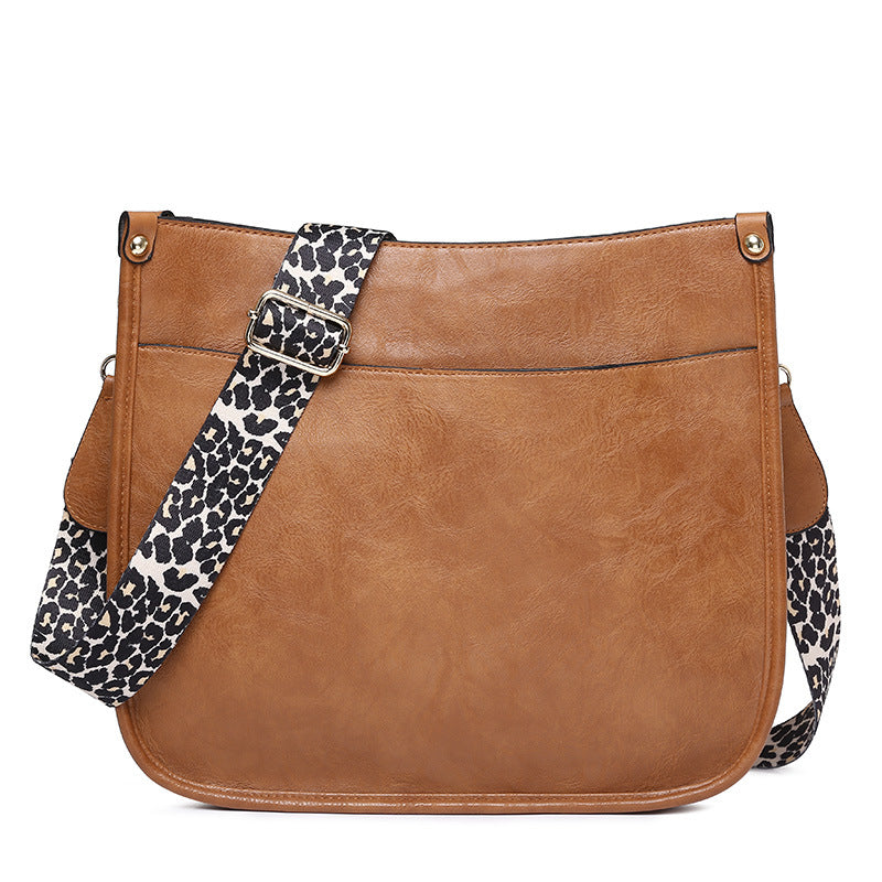 Unik Classic Leather Crossbody Bag with Leopard print shoulder strap