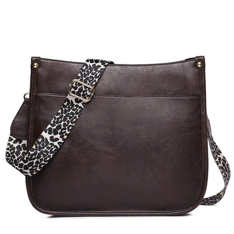 Unik Classic Leather Crossbody Bag with Leopard print shoulder strap