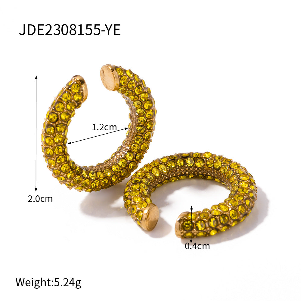 Unik Diamond earrings in 18-karat gold plated stainless steel