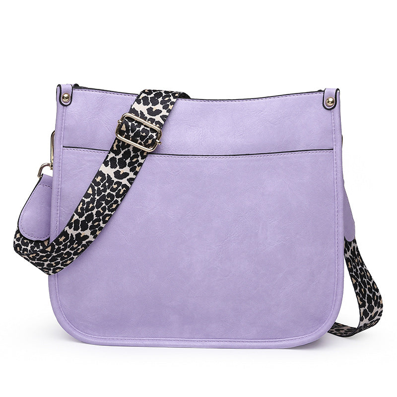 Unik Classic Leather Crossbody Bag with Leopard print shoulder strap
