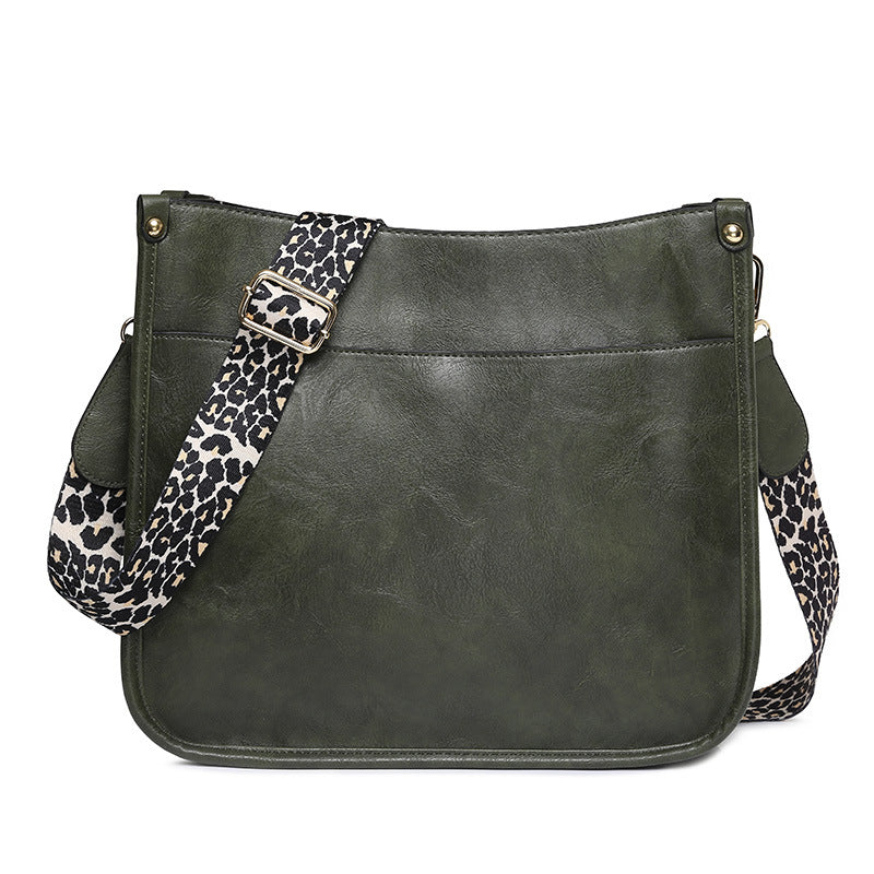 Unik Classic Leather Crossbody Bag with Leopard print shoulder strap