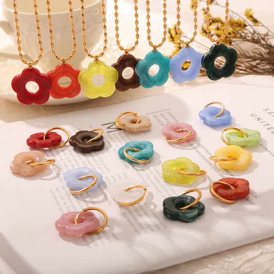Unik Resin hollow flower pendant titanium steel